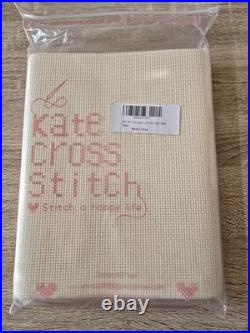 New Cross Stitch Aida Cloth, Bamboo Hoops, Embroidery Floss, and assorted Books