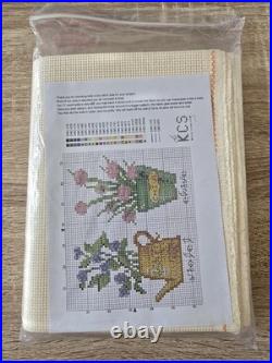 New Cross Stitch Aida Cloth, Bamboo Hoops, Embroidery Floss, and assorted Books