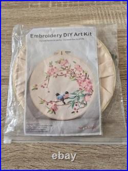 New Cross Stitch Aida Cloth, Bamboo Hoops, Embroidery Floss, and assorted Books